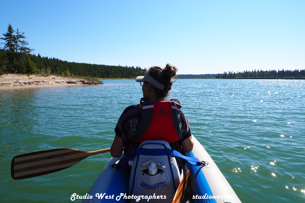 We inflated our Sea Eagle Kayak and paddled the entire perimeter of Pine Lake created by a huge sinkhole. a small beach and a very sharp drop off.
