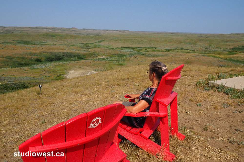 The Red  chairs a common site in Canada's National parks but a beautiful views for one to sit and ponder for awhile.