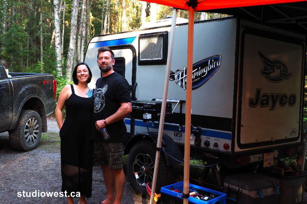 Nick and Mellany with their off grid camper.